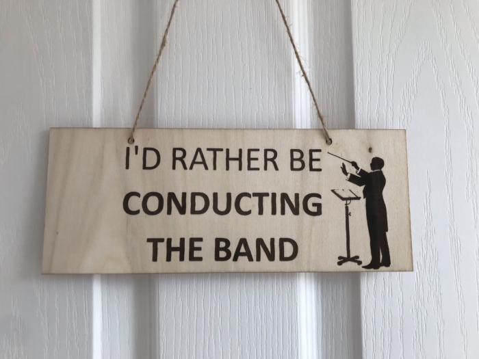 Rather be conducting the band